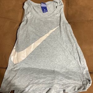 Grey and white Nike tank size S
